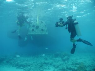 Renowned wildlife phtographer Doug Allan films Reef Ball deployment in the Cayman Islands. Reef Ball Image Gallery